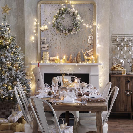 White and gold festive dining room, fireplace, Christmas tree, fairy lights, Pub Orig